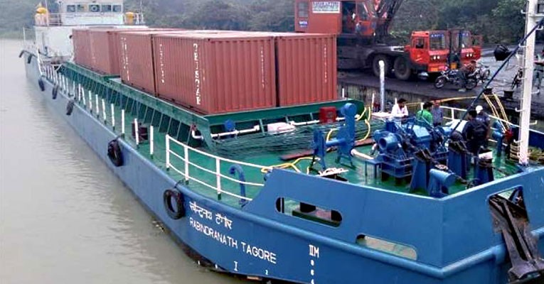 Cargo vessel MV RN Tagore with 16 containers belonging to Pepsico on river Ganges from Kolkata to Varanasi