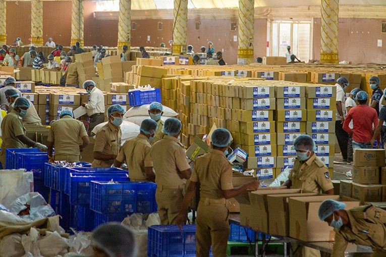 The Akshaya Patra Foundation hired a large Kalyana Mandapa in Palace Grounds in Bangalore to pack 200,000 grocery boxes to be distributed within Bangalore alone