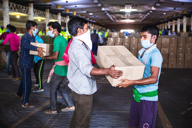 Dry grocery boxes being packed and distributed in Bangalore