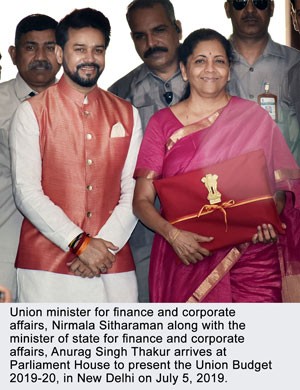 Union minister for finance and corporate affairs, Nirmala Sitharaman (centre) addressing a Post Budget Press Conference, in New Delhi on July 5, 2019.