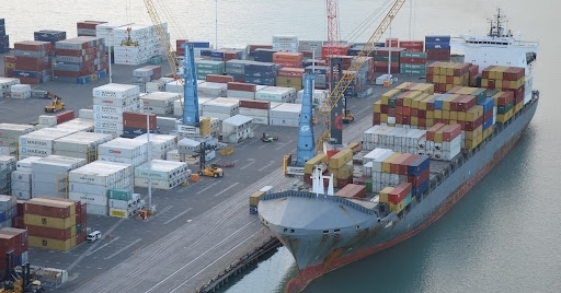 View of cargo being loaded at a wharf in Napier, New Zealand