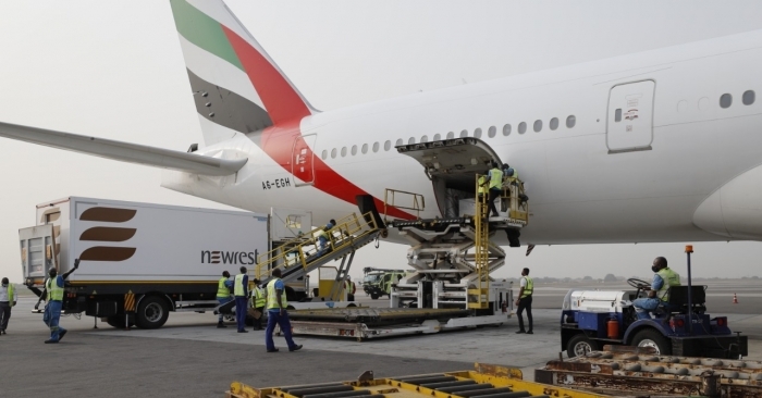 On 24 February 2021, staff unloads the first shipment of Covid-19 vaccines distributed by the COVAX Facility at the Kotoka International Airport in Accra, Ghana.  Photo: UNICEF /Francis Kokoroko