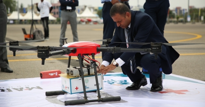MoCA joint secretary Amber Dubey inspecting a Marut medical delivery drone during Wings India 2020 in Begumpet Airport, Hyderabad, Telangana in March 2020.