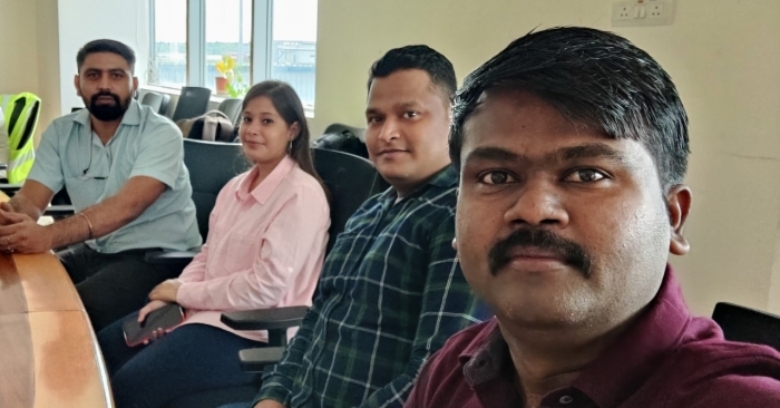 (Left to right) The new members of HLT's India product team, Gulshan Kataria, Divya Gulati, Rohit Bhadbhade, and Ganesh Waydande, visit a customer in Hyderabad.