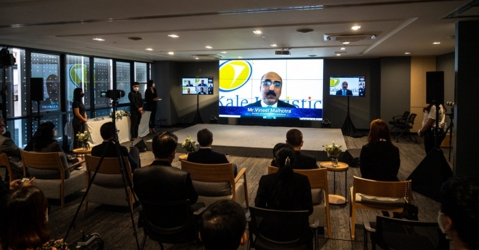 Vineet Malhotra, Director, Kale Logistics Solutions; (above) Malhotra gives his presentation via video link at the signing ceremony.