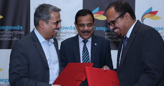 Hari Marar, MD and CEO-BIAL (left) with PN Prasad, DMD-CCG- SBI (centre) and Gireesh Kunnathattil, vice president and group head, large corporates, Axis Bank, during the signing of financial documents.