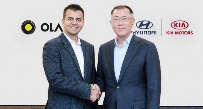 Bhavish Aggarwal, co-founder &amp; CEO, OLA with Chung Eui-sun, executive vice-chairman, Hyundai in March 2019.
