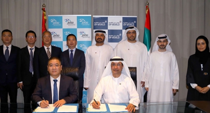 Sultan Ahmed Bin Sulayem, DP World group chairman and CEO, Mohammed Al Muallem, CEO and managing director, DP World, UAE region and Zhao Wenge, group chairman, CCC Group during the signing ceremony at JAFZA.