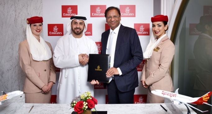 Adnan Kazim, chief commercial officer, Emirates and Ajay Singh, chairman and managing director, SpiceJet and after signing the codeshare agreement.